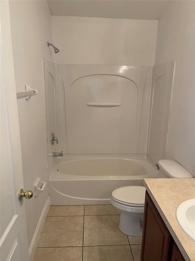 full bathroom with tile patterned flooring, vanity, shower / tub combination, and toilet