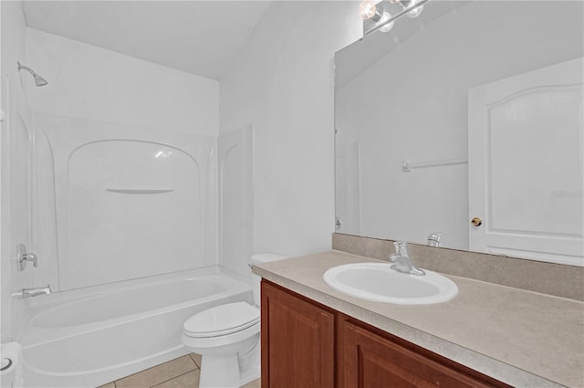 bathroom with tile patterned flooring, shower / bath combination, vanity, and toilet