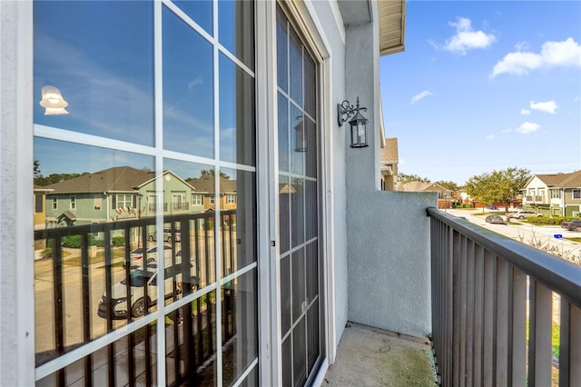 balcony featuring a residential view