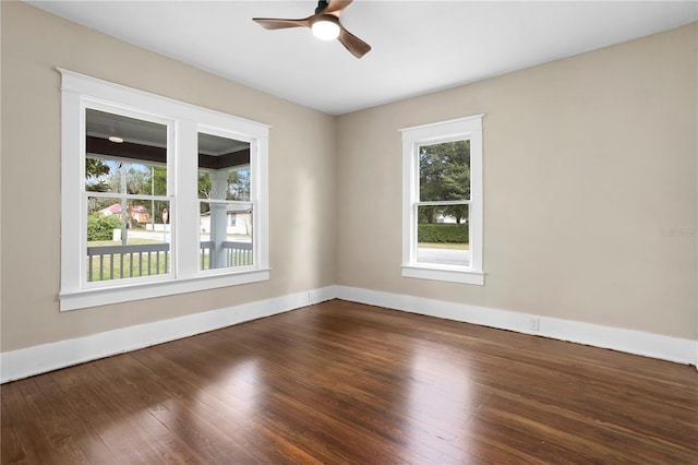 unfurnished room with ceiling fan and wood-type flooring