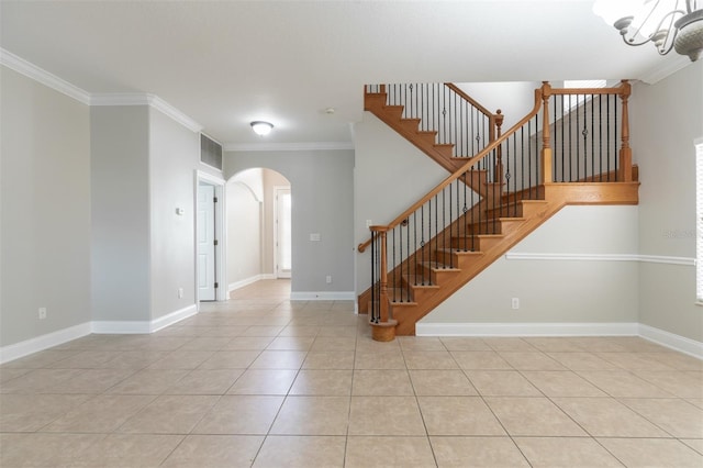 interior space featuring crown molding, plenty of natural light, and tile patterned flooring