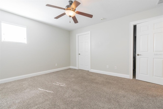 unfurnished bedroom with carpet and ceiling fan