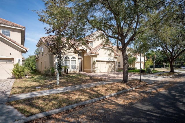 view of front of property featuring a garage