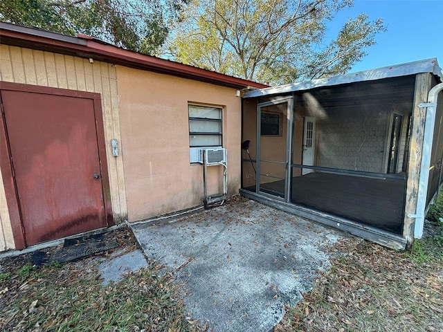 property entrance featuring cooling unit