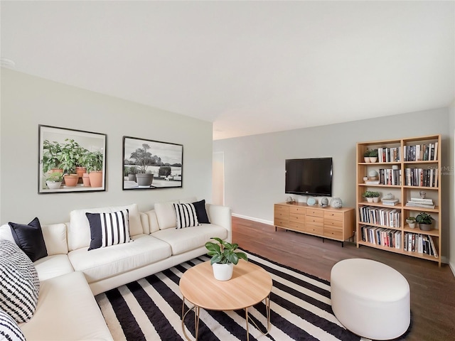 living room featuring dark hardwood / wood-style floors