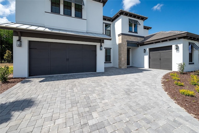 view of front of property featuring a garage