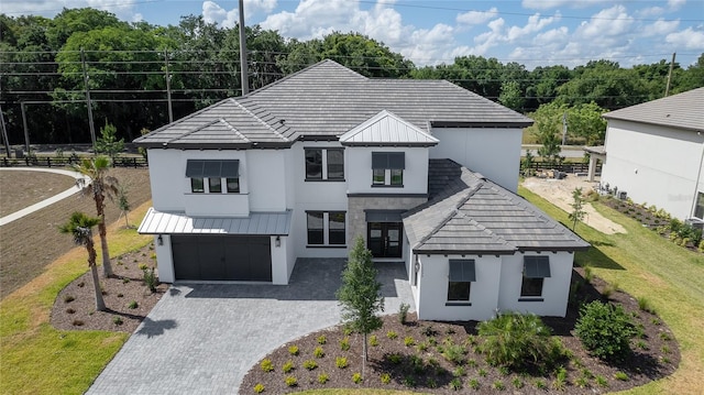 view of front of property with a garage