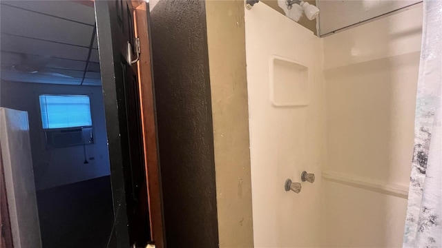 bathroom with a shower with curtain