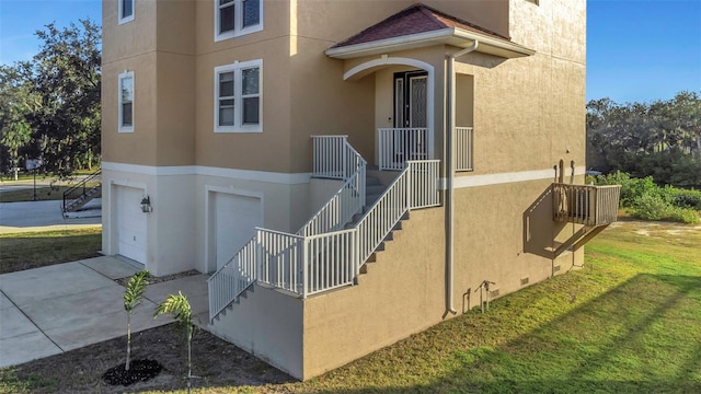 view of exterior entry featuring a garage