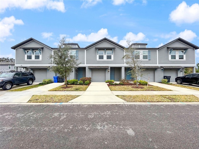 multi unit property featuring a garage