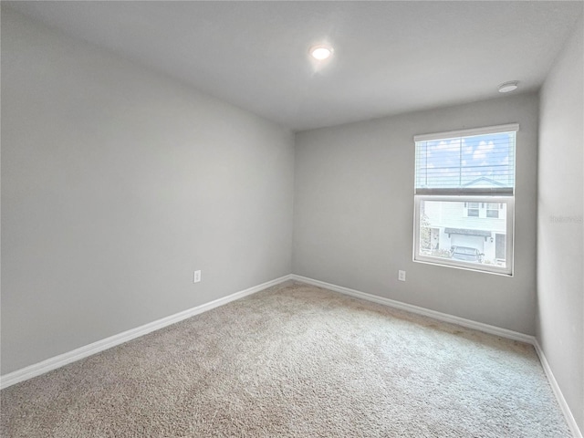 empty room featuring carpet floors