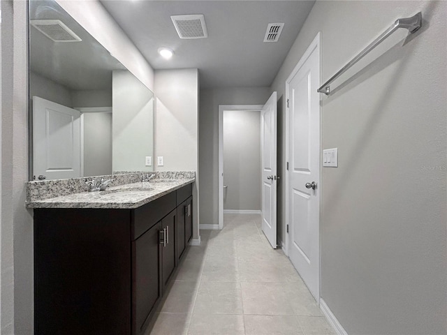 bathroom featuring vanity and tile patterned floors