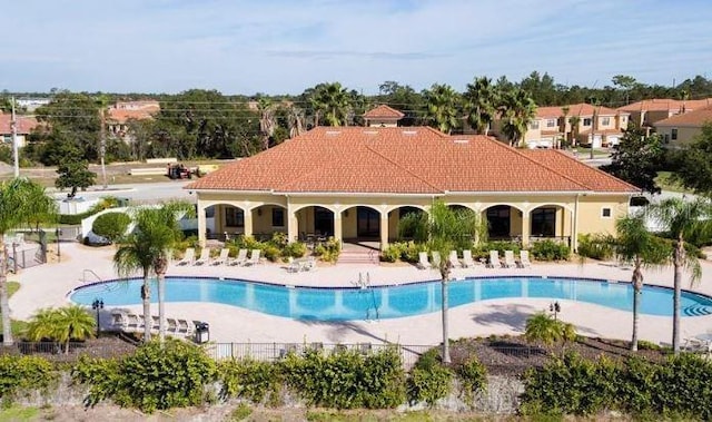 view of swimming pool with a patio area