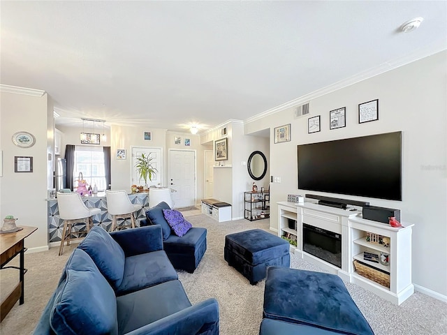 living room with crown molding and light colored carpet