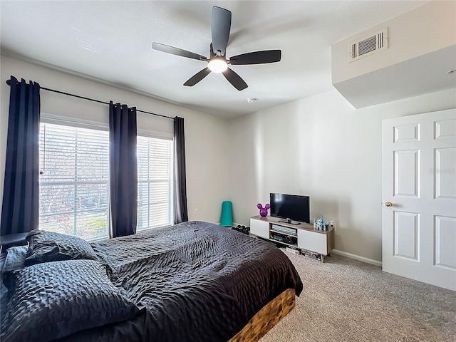 bedroom featuring ceiling fan and carpet floors