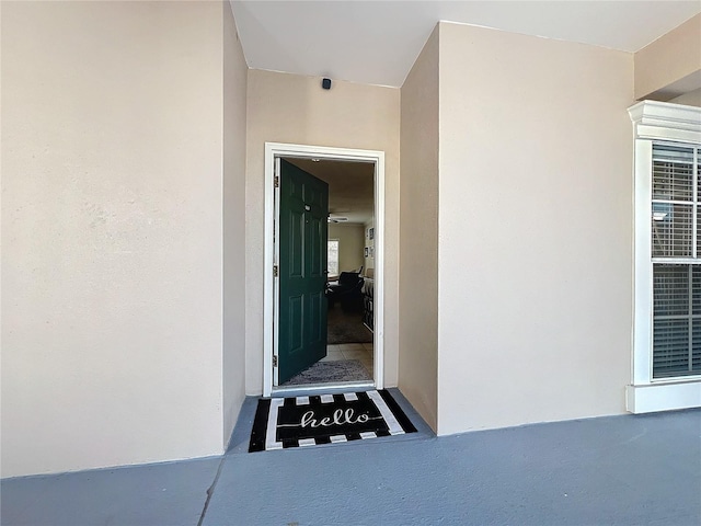 doorway to property featuring a balcony