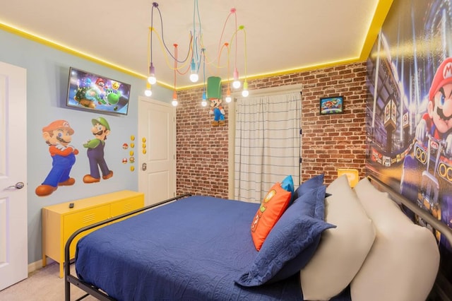 bedroom featuring carpet floors and brick wall