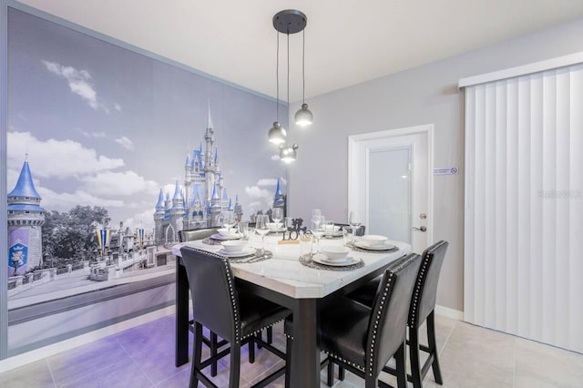 dining space with light tile patterned floors