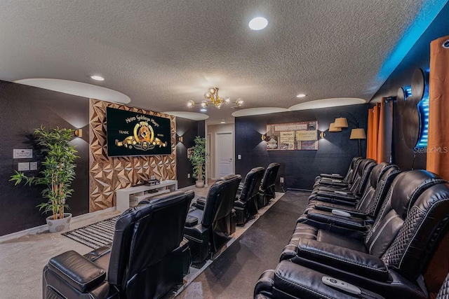 carpeted home theater room with an inviting chandelier and a textured ceiling