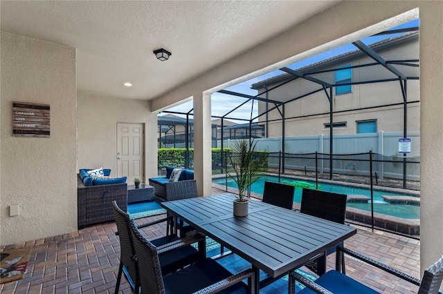 view of patio featuring a fenced in pool, an outdoor hangout area, and glass enclosure