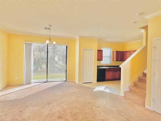 unfurnished living room with sink, crown molding, and light colored carpet