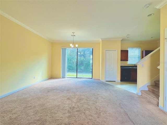 unfurnished living room featuring a wealth of natural light, light carpet, and crown molding