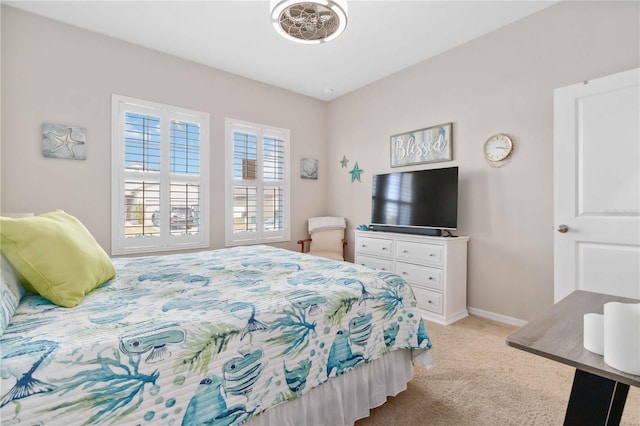 bedroom with light colored carpet