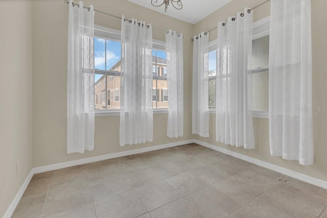 view of tiled spare room