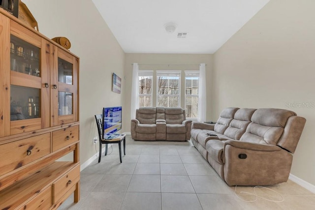 living room featuring light tile patterned flooring