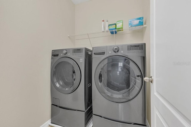 laundry area featuring separate washer and dryer