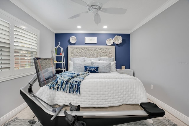 bedroom with ornamental molding and ceiling fan