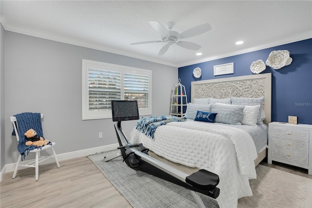 bedroom with ornamental molding, ceiling fan, and light wood-type flooring