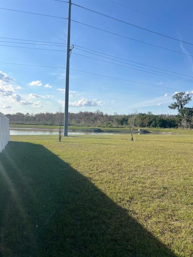 view of yard with a water view