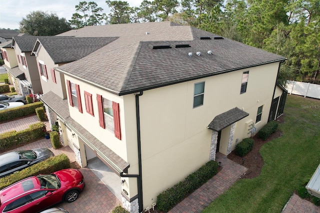 exterior space with a garage