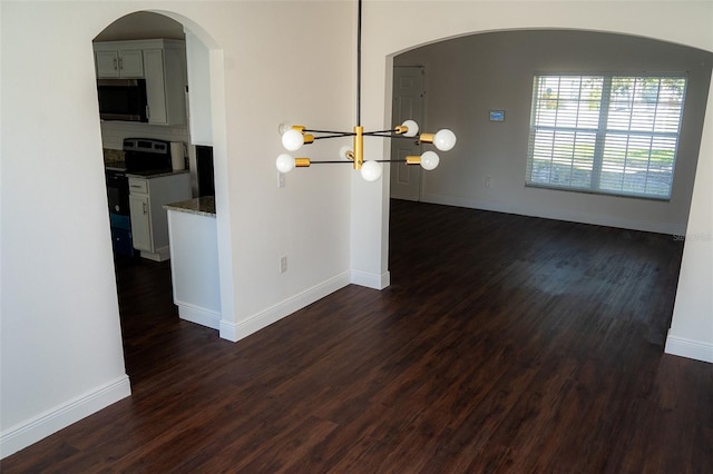 interior space with dark hardwood / wood-style floors