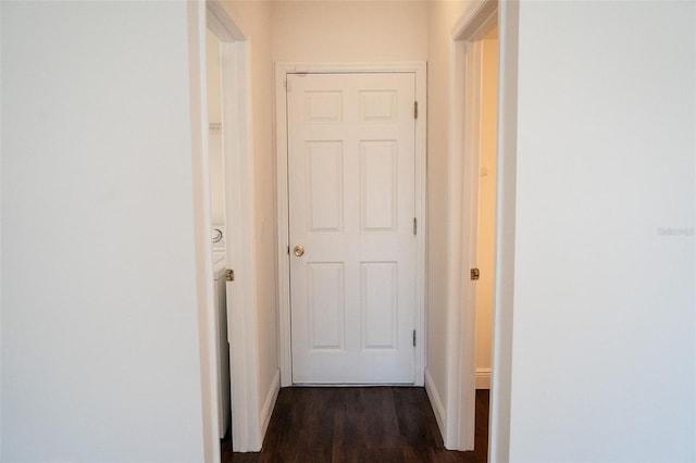 hall featuring dark wood-type flooring