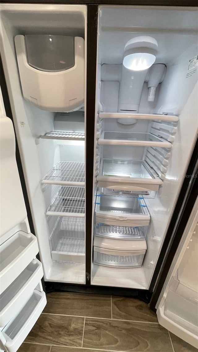 room details featuring stainless steel refrigerator