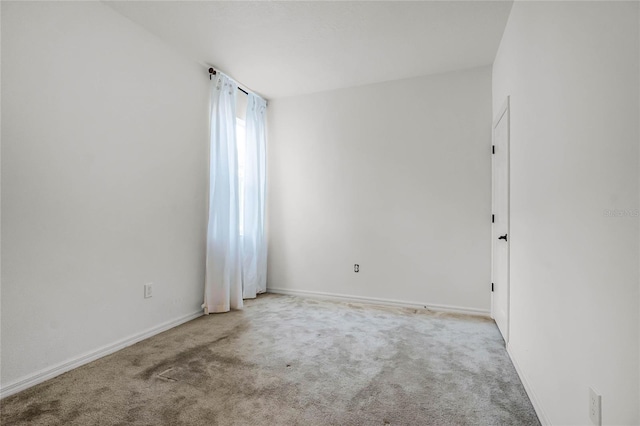 view of carpeted spare room