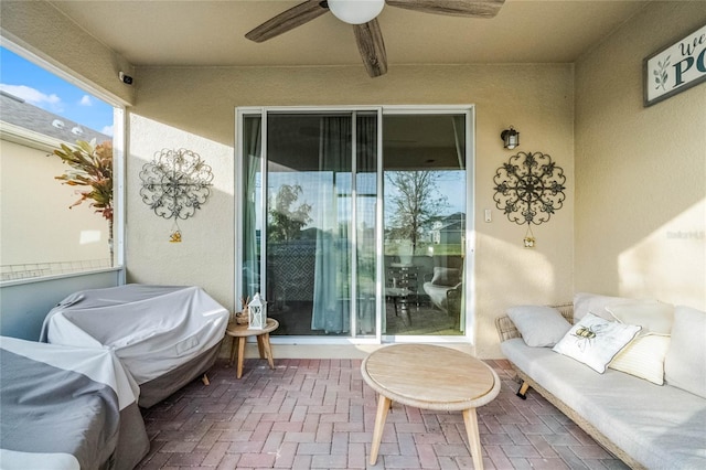 view of patio / terrace featuring ceiling fan