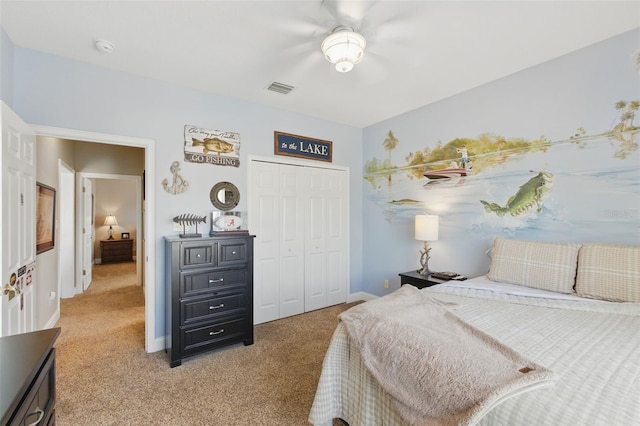 bedroom with carpet and a closet