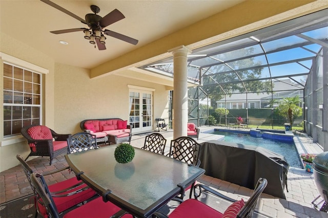 view of patio with an outdoor living space, a fenced in pool, and glass enclosure