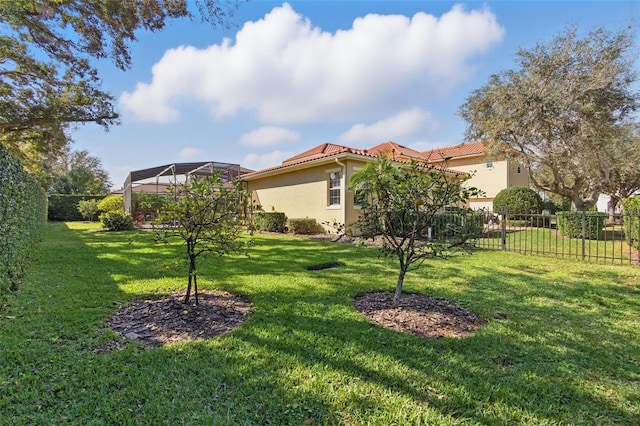 view of yard with a lanai