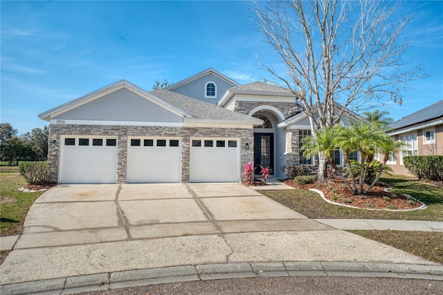 view of front of property featuring a garage