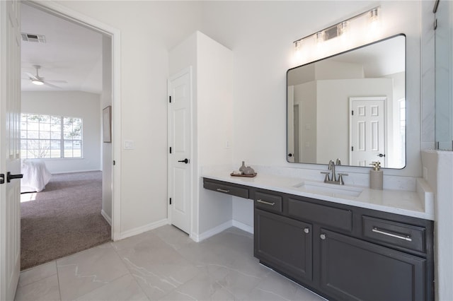 bathroom with vanity, lofted ceiling, and ceiling fan