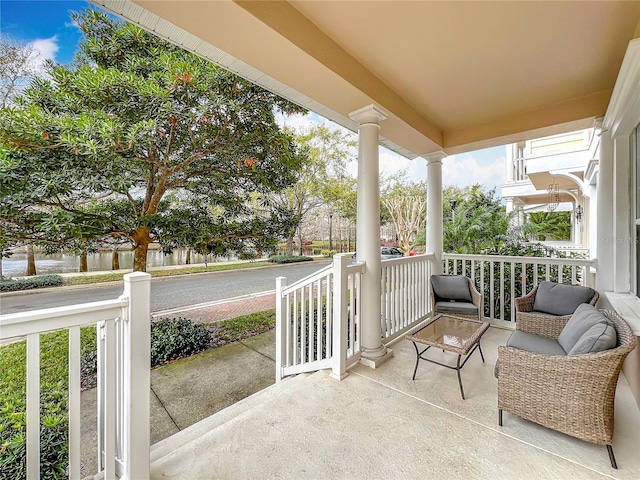 balcony featuring a porch