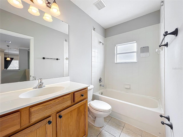 full bath featuring tile patterned floors, visible vents, toilet, and a wealth of natural light