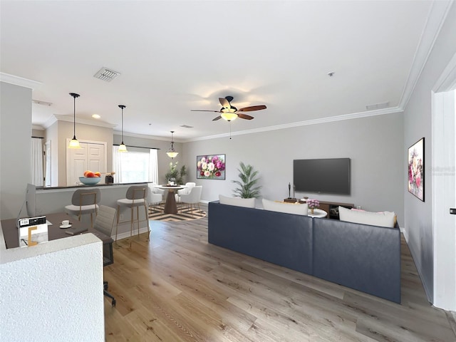 411 Old Farm Ln, Winter Springs, FL 32708 - living area featuring crown molding, wood finished floors, and ceiling fan