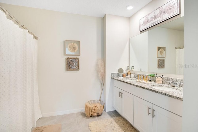 bathroom featuring vanity and tile patterned floors