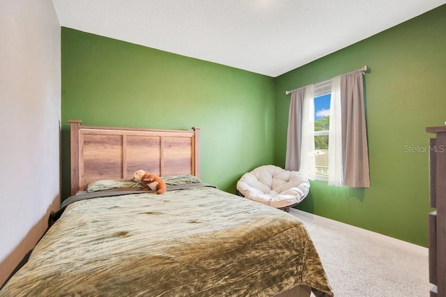 bedroom featuring carpet flooring