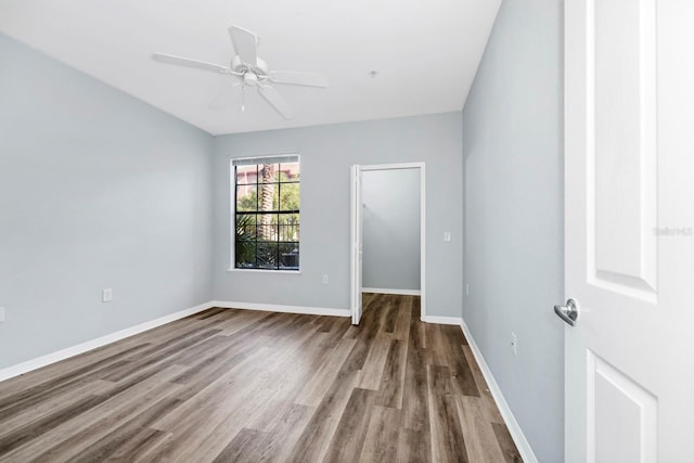 unfurnished room featuring wood-type flooring and ceiling fan